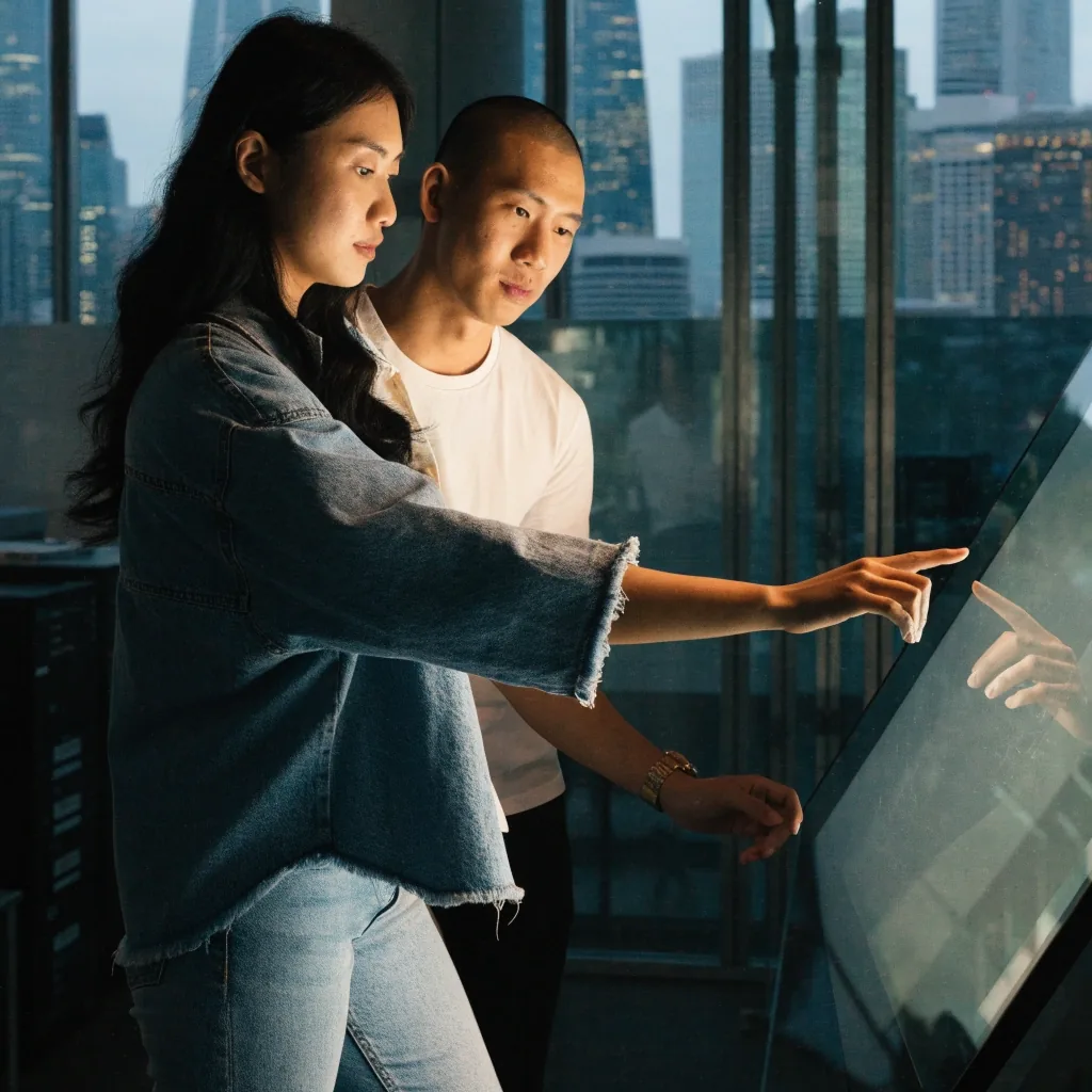 Developer and designer reviewing an interaction flow together at a desk